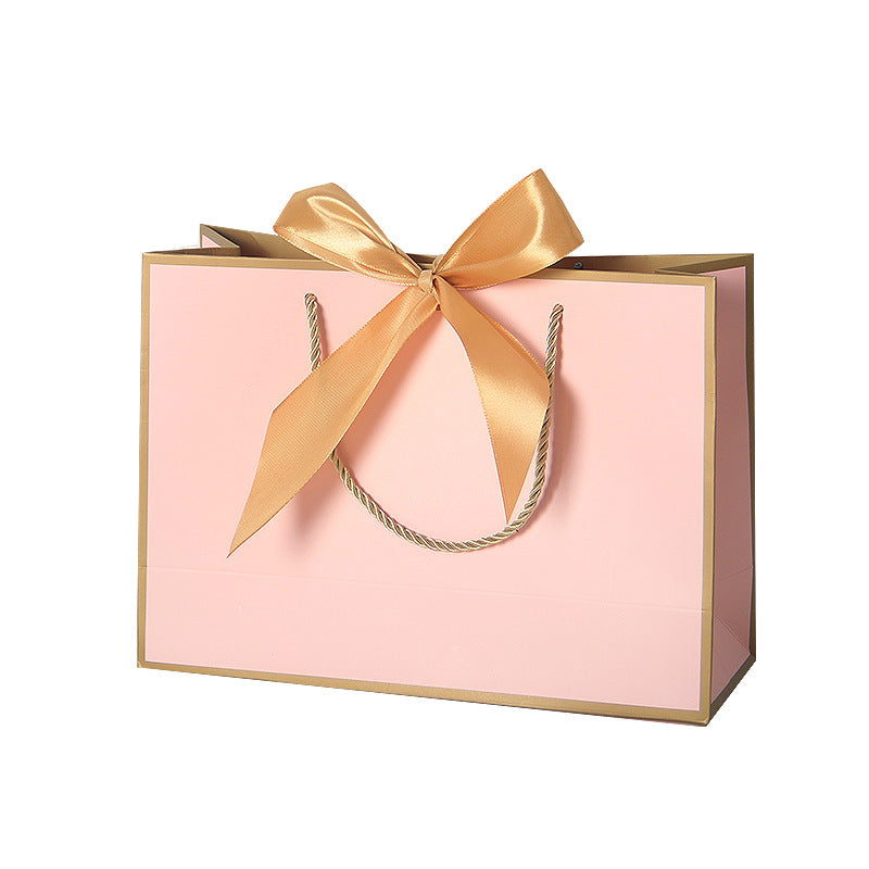 Sac cadeau rose cadre doré