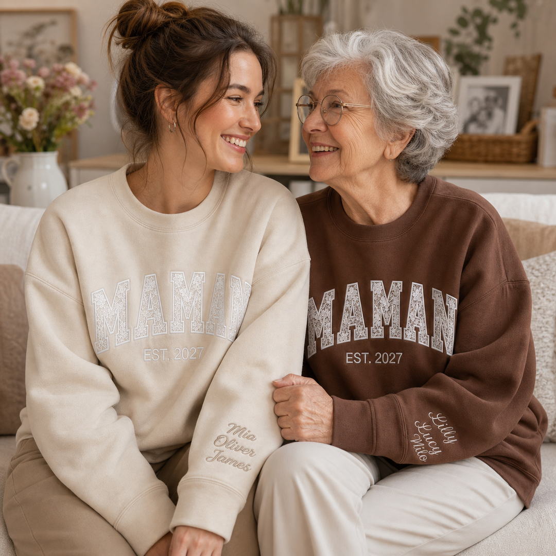Sweat-shirt personnalisé avec détails en dentelle brodée et prénoms d'enfants brodés sur les manches