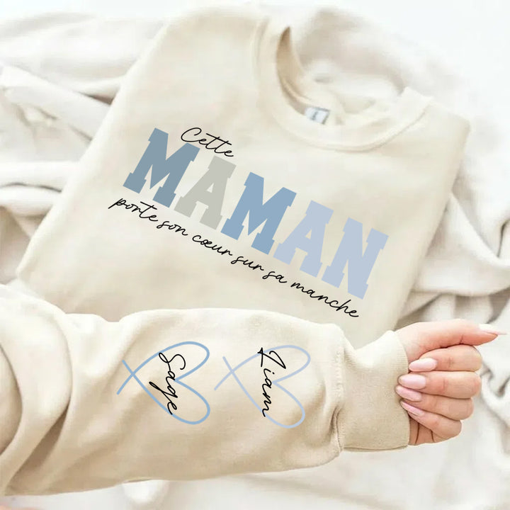 Sweat personnalisé pour Maman – Cette Maman porte son cœur sur sa manche