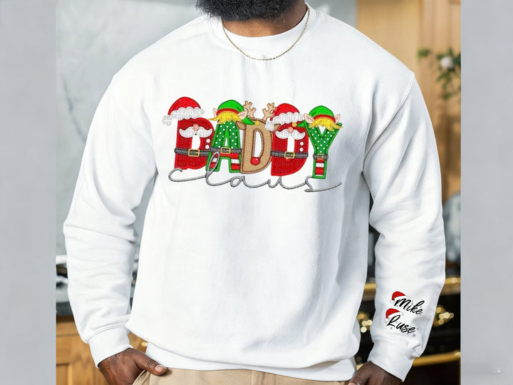 Sweat-shirt de Noël personnalisé « Maman Claus » pour la famille, avec nom Stnta sur la manche.