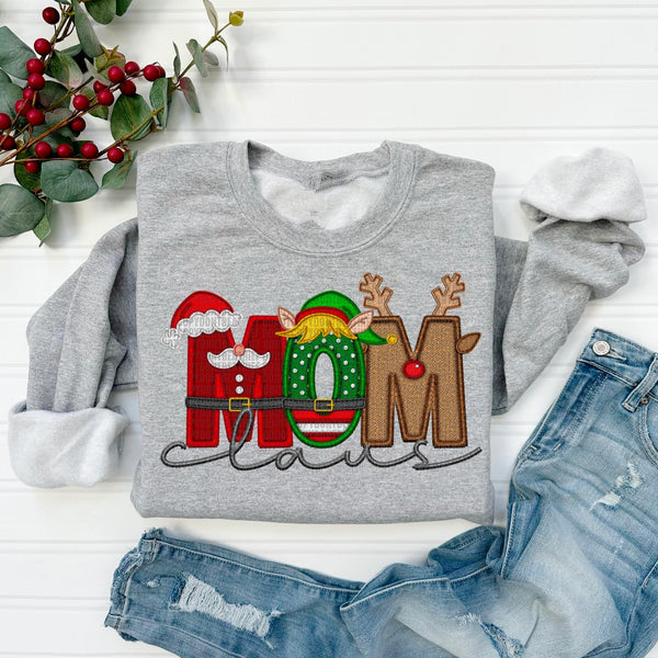 Sweat-shirt de Noël personnalisé « Maman Claus » pour la famille, avec nom Stnta sur la manche.