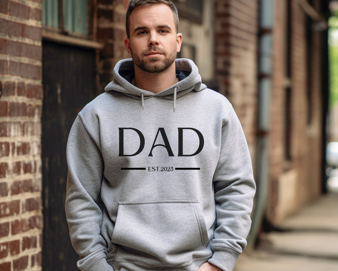 Sweat-shirt personnalisé Dad Est avec des noms d'enfants sur la manche