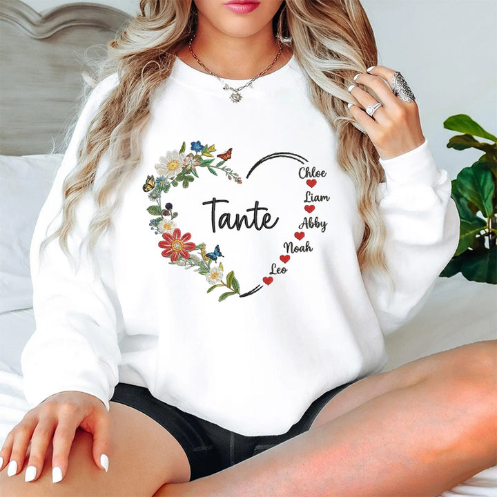 Sweat-shirt personnalisé avec broderie florale en forme de cœur et prénoms des enfants — Pour Grand-mère