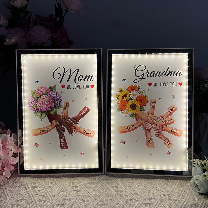 Boîte lumineuse miroir fleurie personnalisée maman et enfants se tenant la main