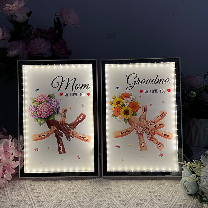 Boîte lumineuse miroir fleurie personnalisée maman et enfants se tenant la main