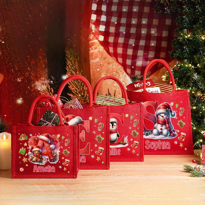Sac cadeau réutilisable en jute rouge, motif pingouin, renne et bonhomme en pain d'épices, personnalisable, avec initiale et prénom, pour Noël