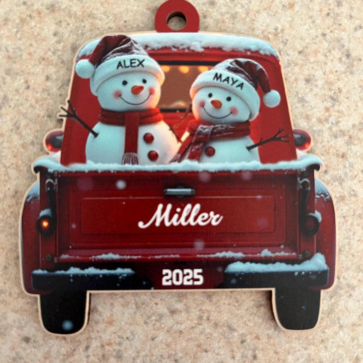 Décoration de Noël personnalisée en forme de bonhomme de neige mignon dans un camion rouge
