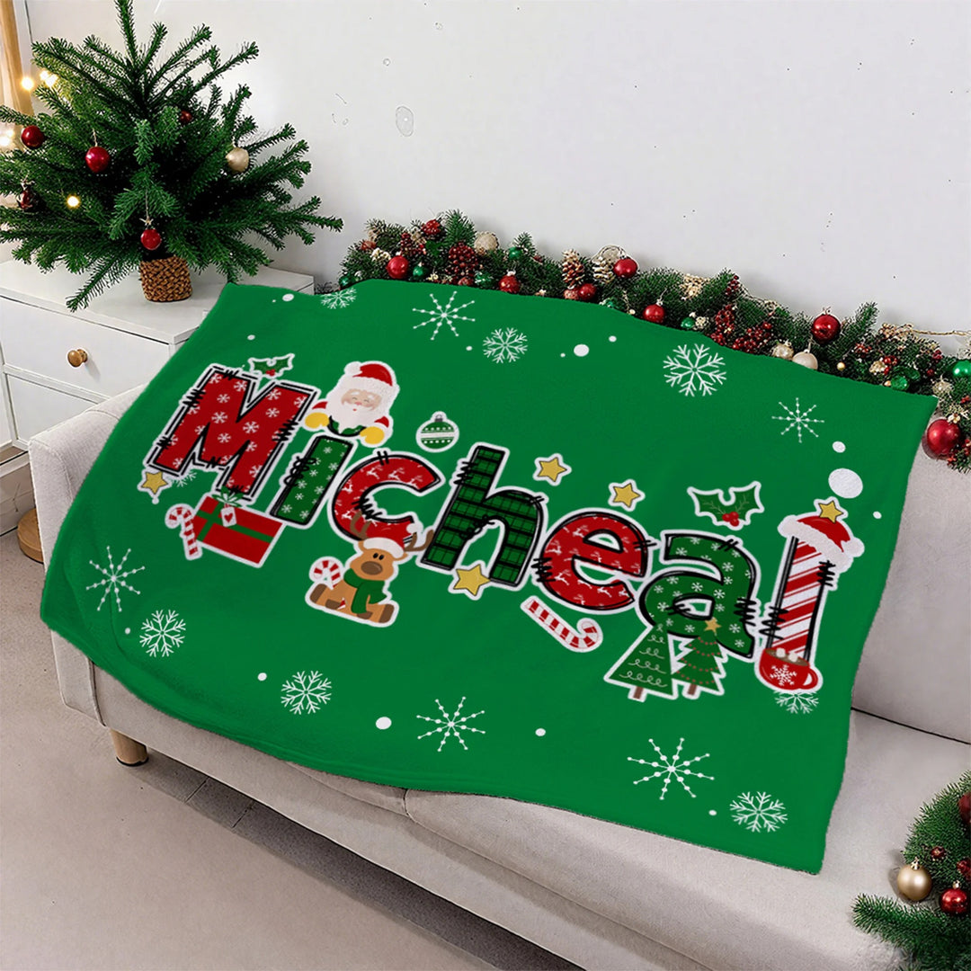 Couverture de Noël personnalisée avec nom de renne et Père Noël, douce et décorative, idéale pour les fêtes de fin d'année.