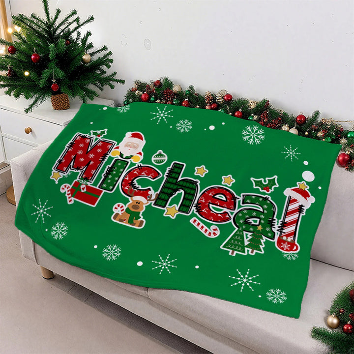 Couverture de Noël personnalisée avec nom de renne et Père Noël, douce et décorative, idéale pour les fêtes de fin d'année.
